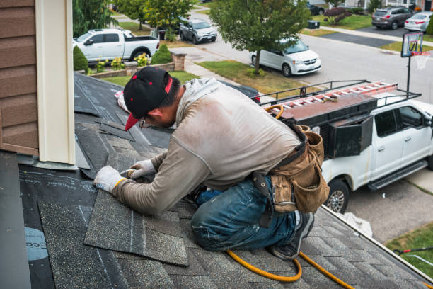 Professional Roofing technician working in Spencerport, NY